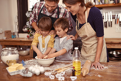 Buy stock photo Family, smile and children baking, learning or happy boys bonding together with parents in home. Father, mother and kids cooking with flour, food and teaching brothers how to make dessert in kitchen