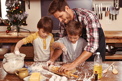 Buy stock photo Father, smile and children baking, learning and happy boys bonding together in home. Dad, kids and cooking with flour, rolling pin and teaching brothers with family at table in kitchen for Christmas