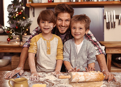 Buy stock photo Dad, portrait and happy children baking at Christmas, learning or bonding together in home. Face, kids and father cooking at xmas on holiday, rolling pin or teaching brothers with family in kitchen