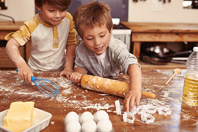Buy stock photo Children, baking and playing in kitchen with ingredients for dessert cake, cookies and fun. Cooking, mess and young brother siblings bonding together for happiness, utensils and smile in house.