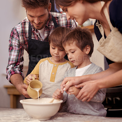 Buy stock photo Children, parents or baking in kitchen with ingredients, home or learning of dessert cake with love. Happy family, teaching or bowl for cookies on table, care or bonding together on holiday in house