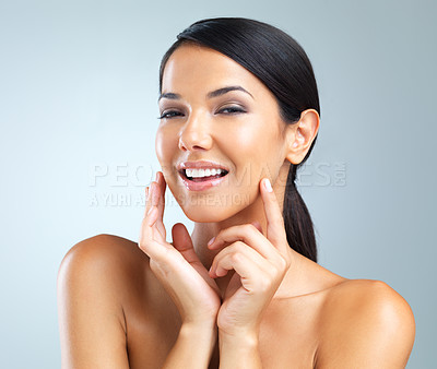 Buy stock photo Portrait, woman or smile for skincare, glow and dermatology in studio on light grey background. Happy, female person and happiness for facial, hydration or moisturizing treatment for flawless skin