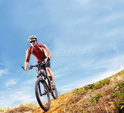 Buy stock photo Nature, fitness and man athlete with bicycle in park for marathon, race or competition training. Blue sky, sports and male cyclist riding bike for cardio workout or exercise in outdoor forest.