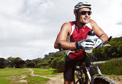 Buy stock photo Fitness, smile and man cycling in countryside for training, cardio or adventure on off road path. Exercise, sports and thinking with cyclist person on bike in nature for health, workout or challenge