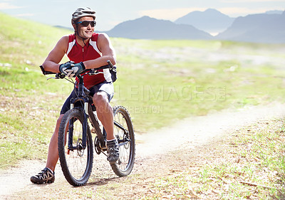 Buy stock photo Nature, sports and man athlete with bicycle in park for marathon, race or competition training. Fitness, cycling and male cyclist riding bike for cardio workout or exercise by outdoor mountain.
