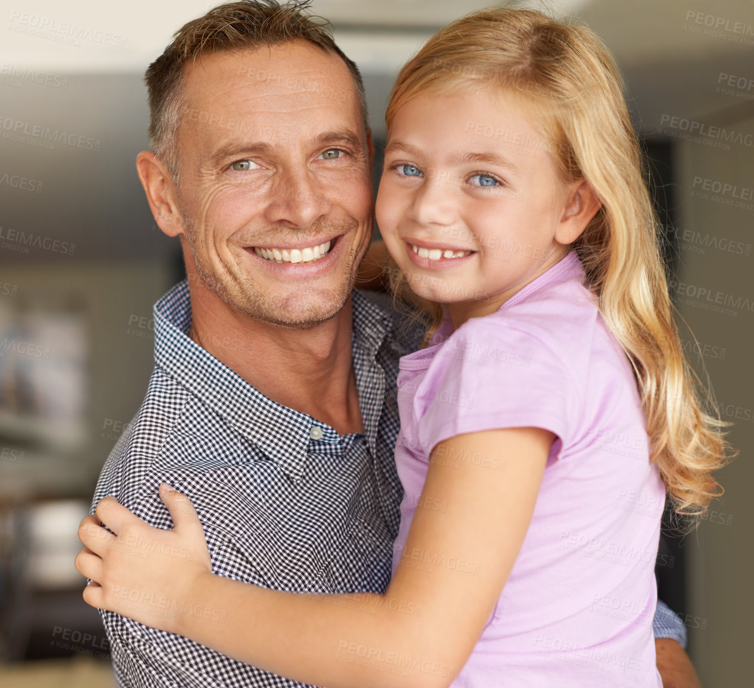 Buy stock photo Portrait, father and daughter in home with love, embrace and parent care on weekend in living room. Dad, child and smile on face of happy family, support and bonding together on vacation in house