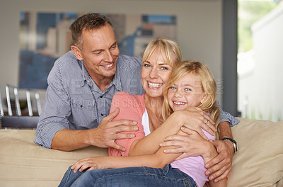 Buy stock photo Portrait, child or parents on couch with love, relax or bonding together for peace on weekend. Father, mother and  daughter for happy family with care, vacation and excited face for hugging in lounge