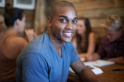 Buy stock photo Portrait, smile and student man with group, African male scholar and happy for university knowledge. Relax and break from book study, learning from research at table for educational development