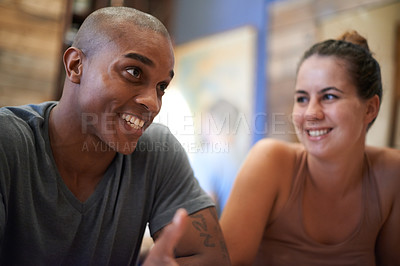 Buy stock photo Happy, man and woman in cafe for talking, smile and laughing together in conversation. People, discussion and communication in meeting diverse, friends and chat while relaxing or enjoying restaurant