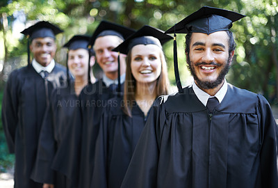 Buy stock photo Graduation, university and man for portrait, ceremony and friends for education and college for diploma. Outdoor, degree and celebration for classmates, campus and certificate with cap and gown