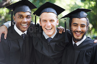 Buy stock photo A group of happy male students on graduation day