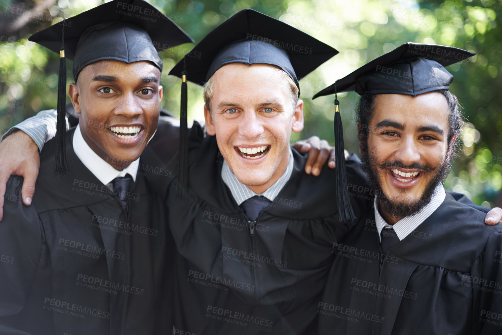 Buy stock photo A group of happy male students on graduation day