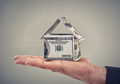 Buy stock photo Hand, cash and finance for house in studio with shape for security, real estate or investment by background. Home, insurance with money, dollars and symbol for property, mortgage or rent of building