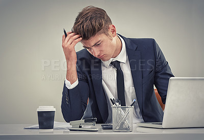 Buy stock photo Man, accountant and laptop with stress for finance, fail or recession in studio with thinking for solution. Person, audit or budget with anxiety for low revenue, profit and frustrated with results