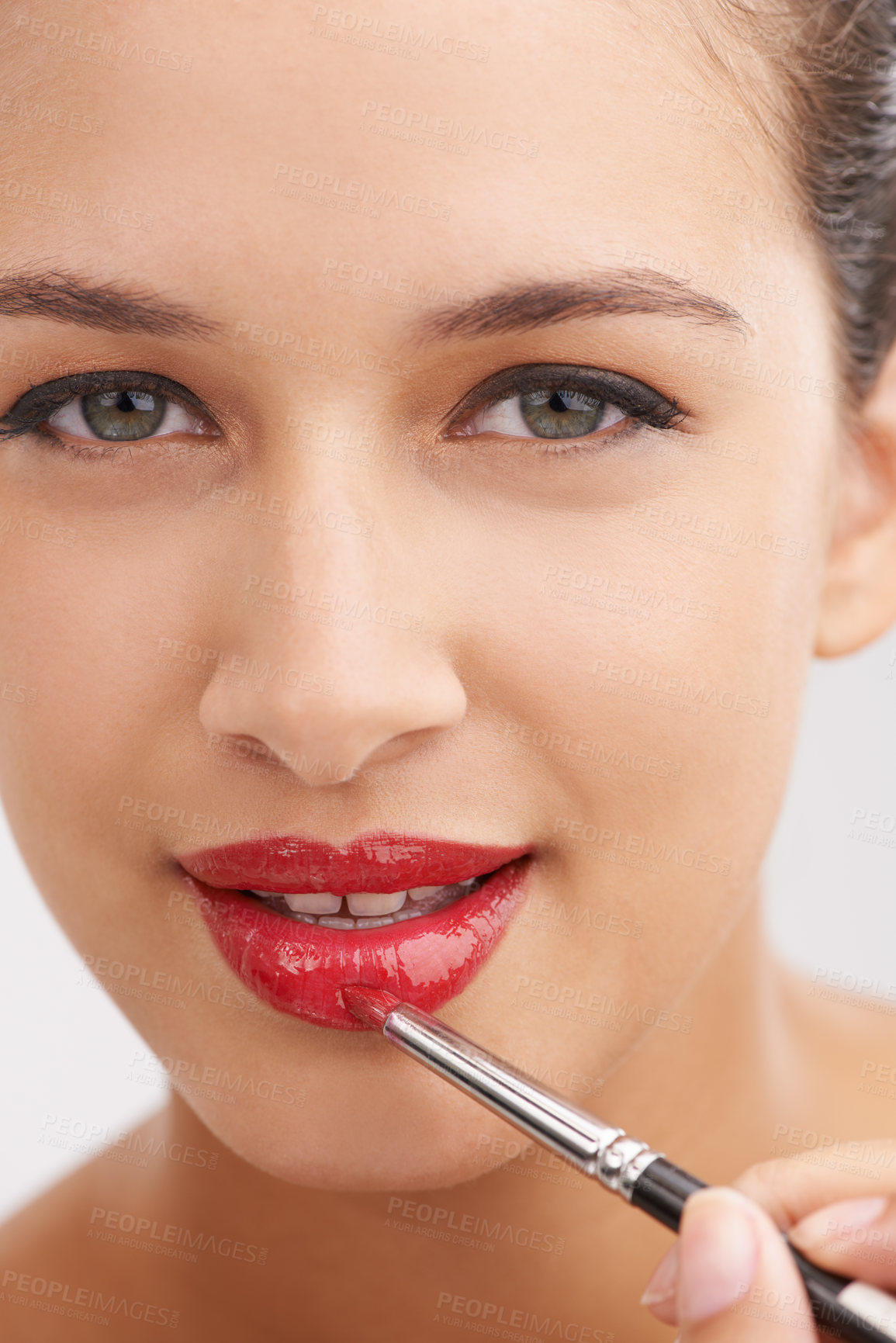 Buy stock photo Happy woman, portrait and red lipstick with makeup for beauty or facial cosmetics on a white studio background. Face or closeup of female person or model applying color, gloss or glow for cosmetology