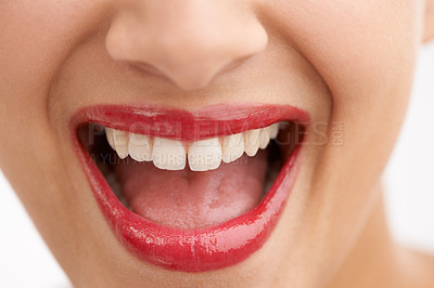 Buy stock photo Happy woman, teeth and red lipstick with makeup for beauty, cosmetics or dental care on a white studio background. Closeup of person or model in satisfaction for lip gloss, glow or tooth whitening