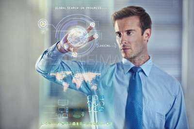 Buy stock photo Cropped shot of a handsome young businessman using a digital interface