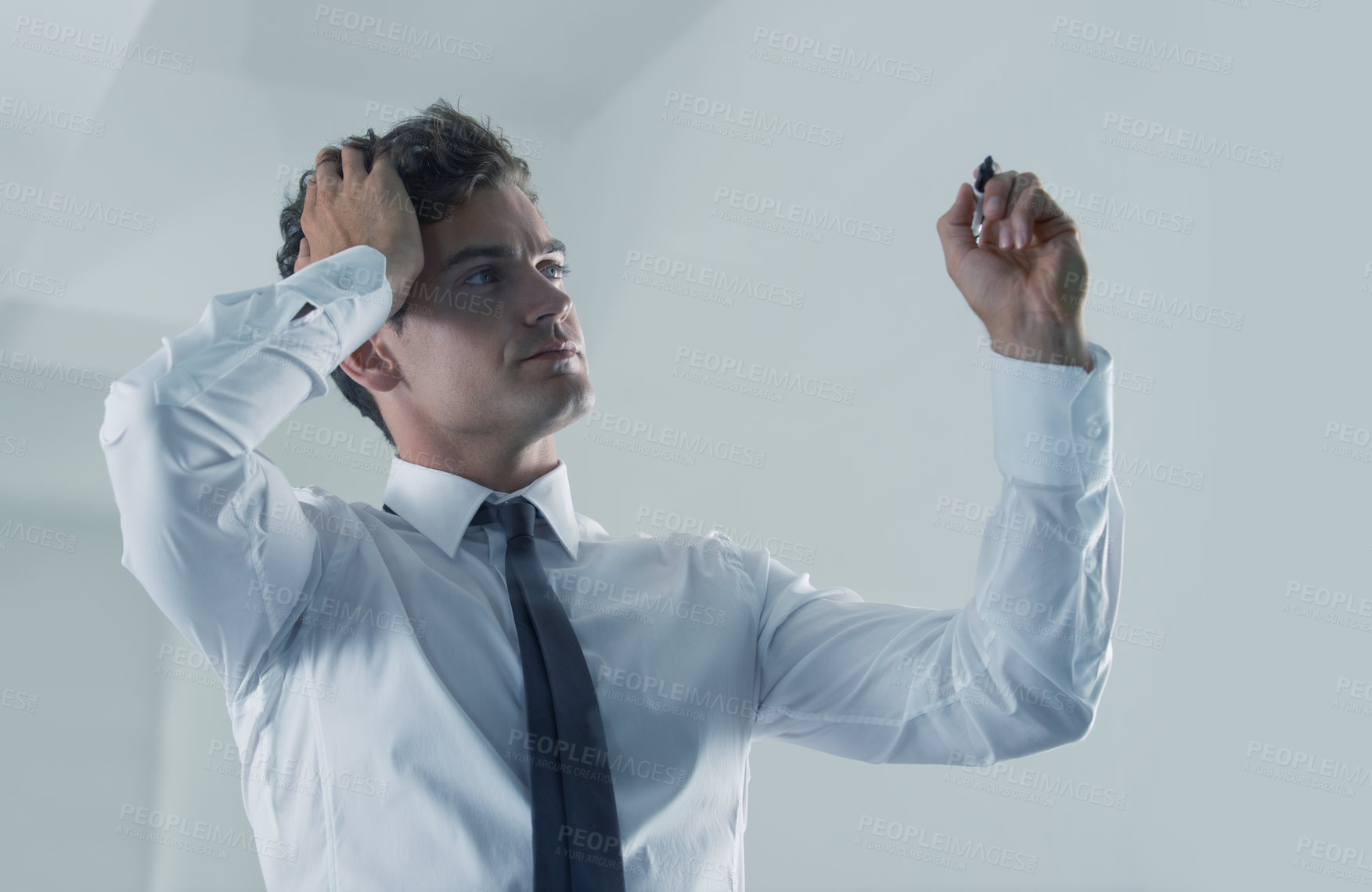 Buy stock photo Businessman writing on glass in office for planning, strategy and ideas for business deadline. Vision, thinking and stressed or tired male brainstorming a solution to a problem or decision in crisis