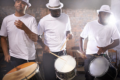 Buy stock photo Man, drums and group band playing with instrument at festival, carnival or night party with lens flare. Male person, talented drummer or young musicians at concert for music performance and audition