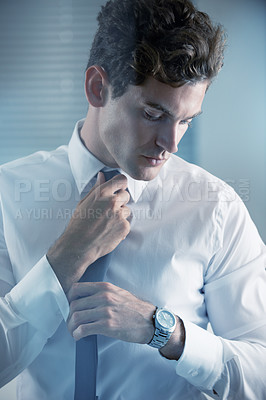 Buy stock photo Thinking, tie and getting ready with business man in studio on white background for start of career. Corporate, company and professional with young professional employee dressing for work interview