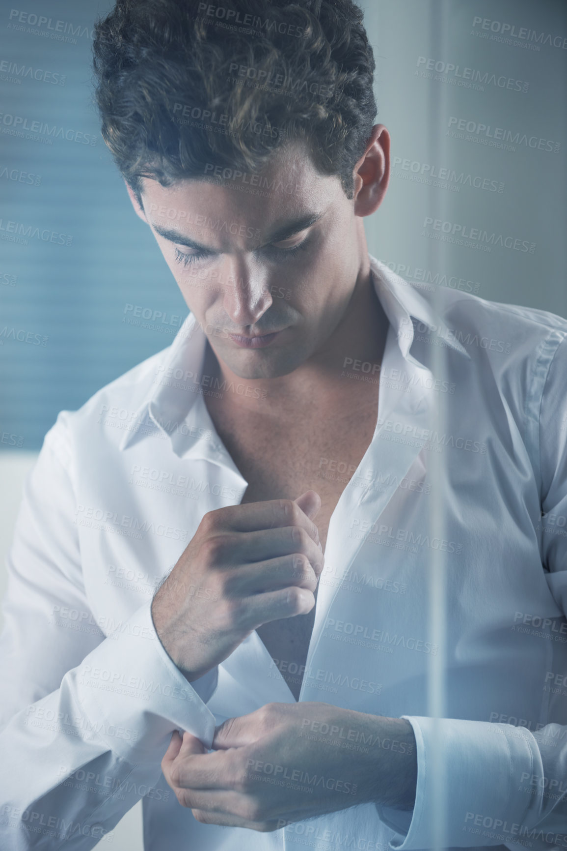 Buy stock photo Morning, shirt and business man getting ready in bedroom of home for start of career or work. Corporate, fashion and dressing with button on sleeve of young employee in apartment for professional job