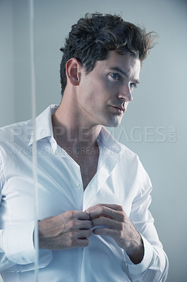 Buy stock photo Businessman, morning and shirt button ready for office work, corporate and professional with confidence or proud. Male person, fashion and dressing while thinking, job and company for career