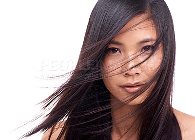 Buy stock photo Woman, portrait and wind for hairstyle in studio, beauty and pride for keratin on mockup space. Asian female person, breeze and shampoo for cosmetic on white background, hair treatment and care