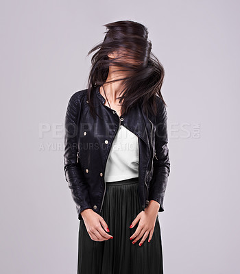 Buy stock photo Shot of a woman in studio dressed in fashionable attire