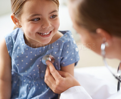 Buy stock photo Happy, child and stethoscope of pediatrician for healthcare consulting, check lungs and breathing for heartbeat. Medical doctor, kid and chest assessment in clinic, hospital and helping girl patient