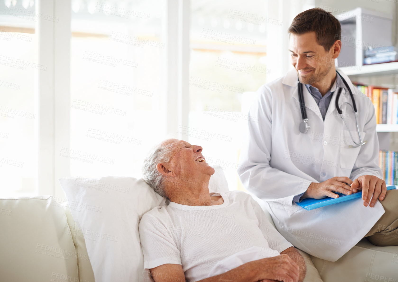 Buy stock photo Doctor, smile and elderly man on sofa with support, consultation or plan for treatment. Medical professional, healthcare and patient with happiness for trust, help or discussion on test results