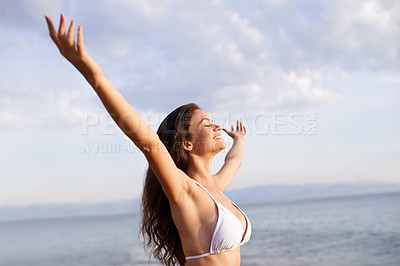 Buy stock photo Peace, hands up or happy woman at sea for travel adventure to relax on holiday vacation. Bikini, breathe or female person at beach with open arms in nature for fresh air, freedom or gratitude in Bali