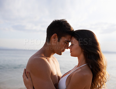Buy stock photo Beach, date and couple with love on holiday, vacation or travel to sea together in summer. Romantic, moment and man with gratitude for woman and embrace with kindness, care and support for partner