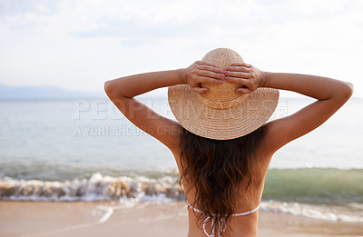 Buy stock photo Hat, hands up or woman at sea for travel adventure to relax on holiday vacation in summer or Bali. Back, breathe or female person at beach with open arms in nature for fresh air, freedom or gratitude