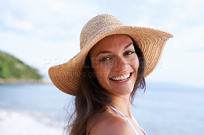 Buy stock photo Beach, smile and portrait of woman on vacation, adventure or holiday for tropical travel. Happy, nature and female person with hat by ocean or sea water on outdoor summer weekend trip by island.