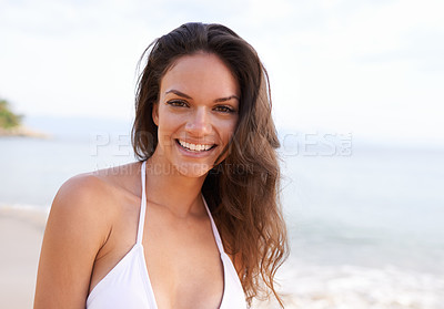 Buy stock photo Beach, nature and portrait of woman for travel on tropical vacation, adventure or holiday. Happy, smile and female person with positive attitude by ocean on outdoor summer weekend trip by island.