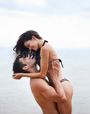 Buy stock photo Couple, beach and ocean with love, smile and romance with swimwear and bikini. Man, woman and date with holiday, vacation and adventure with nature for cape town summer travel and happiness for trip