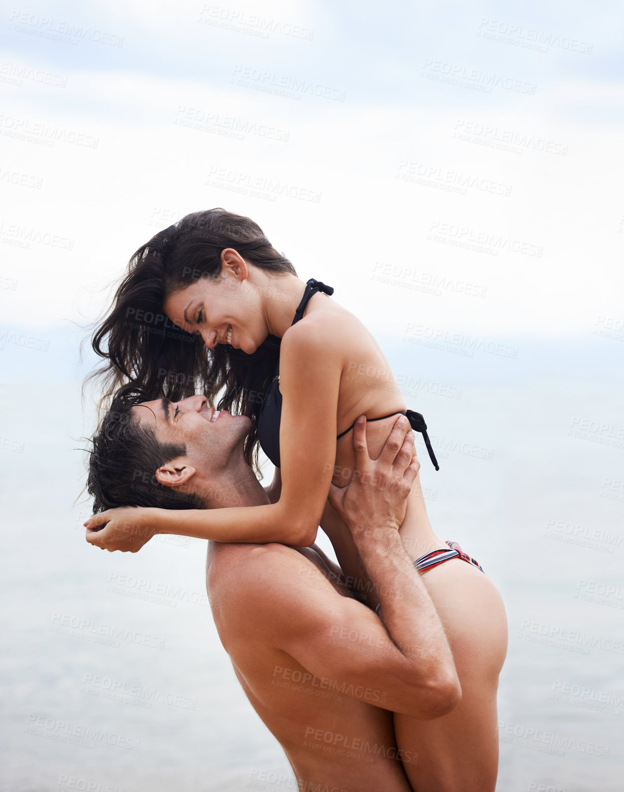 Buy stock photo Couple, beach and ocean with love, smile and romance with swimwear and bikini. Man, woman and date with holiday, vacation and adventure with nature for cape town summer travel and happiness for trip
