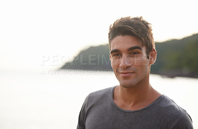 Buy stock photo Man, portrait and tourist smile on beach, nature and travel on summer holiday in Brazil. Happy male person, relax and peaceful wave on ocean adventure, mockup space and horizon or sky on vacation