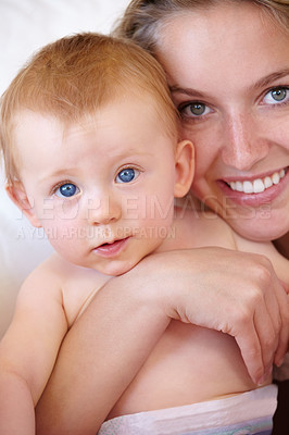 Buy stock photo Portrait, hug and family with baby, mother and home with comfort, nurture and bonding together. Apartment, mama or infant with care or relationship with love or child development with support or face