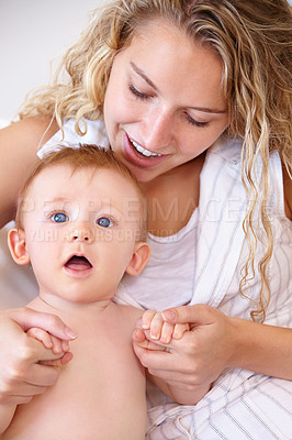 Buy stock photo Happy mother, baby and love with care, trust or bonding together on holiday or weekend at home. Face of mom and little toddler with smile for family, childhood or motherhood in relax at the house