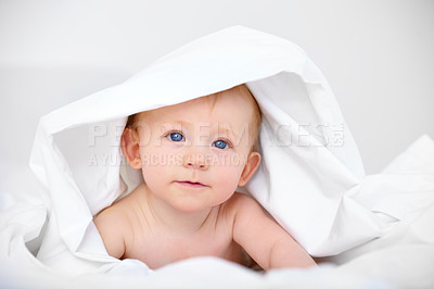 Buy stock photo Portrait, baby and bedroom in duvet, child and sleep or rest in blanket. Sweet face, joy and childhood development for adorable kid, lying and curious in home nursery while relaxing or playing