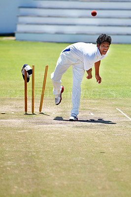 Buy stock photo Cricket field, game and man with sports, exercise and fun with competition and grass with sunshine. Person, athlete and player with a ball or sunshine with training or practice with summer and cardio