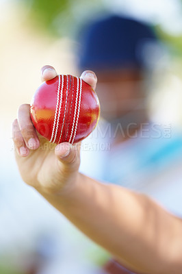 Buy stock photo Cricket, sports and hand of athlete with ball at a game for catch on outdoor pitch. Fitness, active and closeup of wicket keeper with equipment for practice, training or match on field with technique