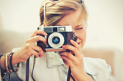 Buy stock photo Closeup shot of a beautiful young woman taking a photograph