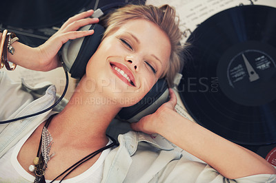 Buy stock photo Happy, music and woman with headphones on floor for streaming subscription, audio and radio. Podcast, smile and above of person listening to playlist, song and track for relaxing in home with vinyl