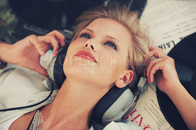 Buy stock photo Vinyl, music and woman with headphones on floor for streaming subscription, audio and radio. Podcast, happy and above of person listening to playlist, song and track for relaxing in home with records