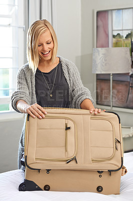 Buy stock photo Bedroom, smile and woman packing a suitcase for vacation, holiday or planning to travel. Home, happy person and luggage for trip preparation, journey and getting ready for tourism with bag on bed