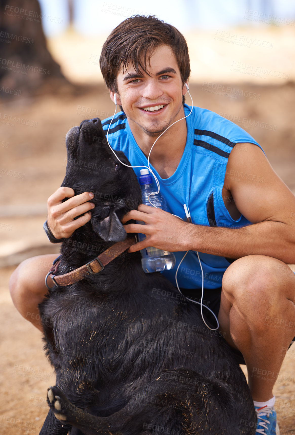 Buy stock photo Smile, man and fitness portrait with dog on hiking trail , walking pet in nature for wellness in health. Listening, music and headphone in relaxing environment or workout, running in cardio exercise