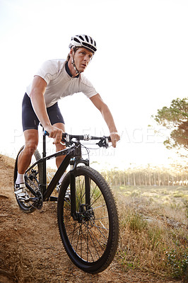 Buy stock photo Man, bike and forest for nature, off road and cycling for health and wellness. Athlete, bicycle and training for workout, transportation and exercise with cape town mountain trail for fitness