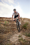 Taking his bike along the trails